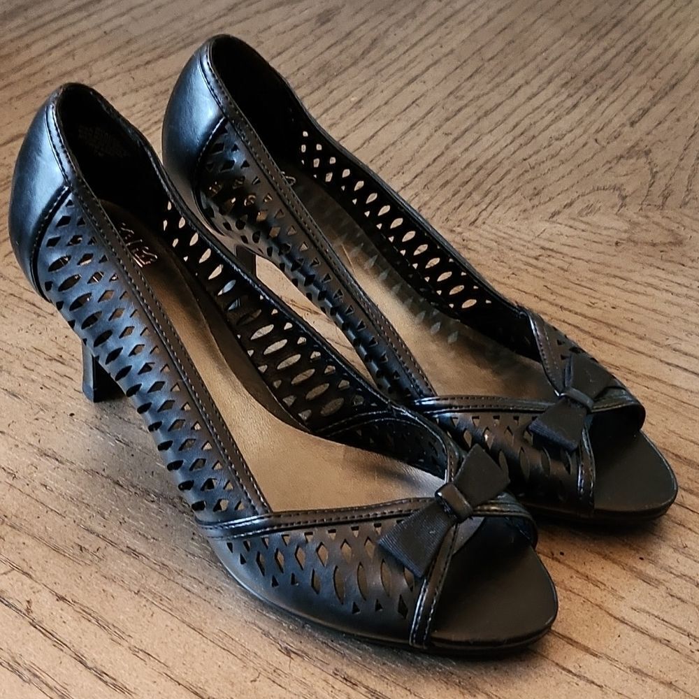 Black open toe perforated heels size 7 New never worn